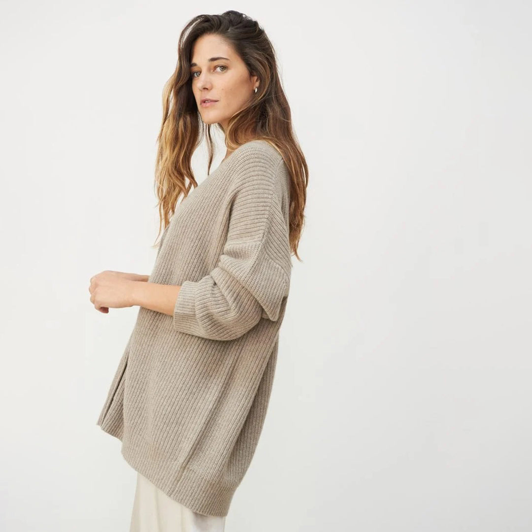 Emma Luxe Cardigan - The perfect combination of comfort and style for your wardrobe. Wrap yourself in luxury with this wonderfully soft and lightweight cocoon cardigan, designed to enhance your everyday look.
