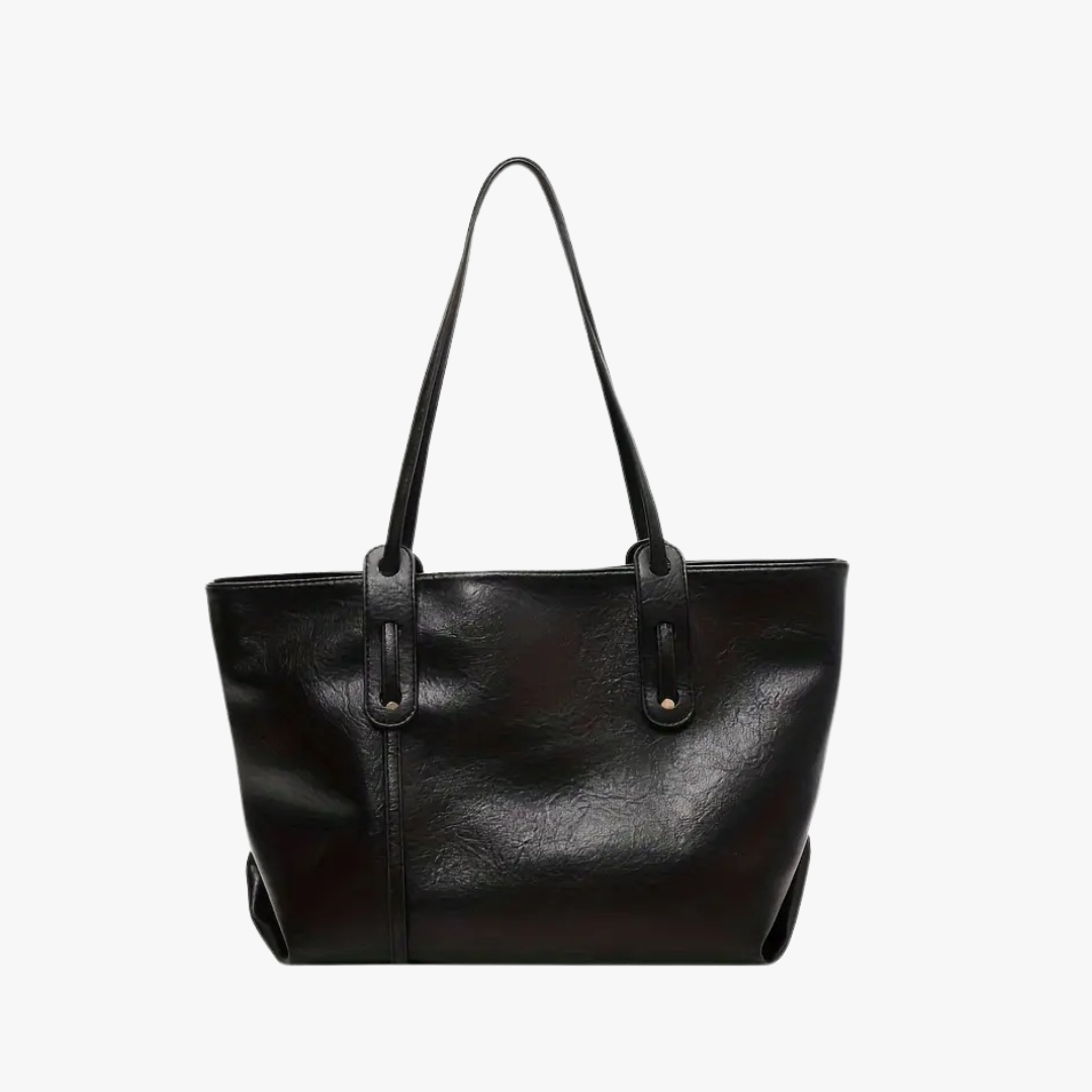 Zafira's Luxe Carry Bag Made of Premium Vegan Leather: A Stylish Choice for the Conscious Woman