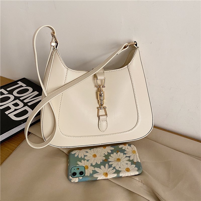 Elara's Elegant Shoulder Bag - A Unique Bag that Combines Timeless Vintage Charm and Practical Functionality. Made from Soft Vegan Leather with a Spacious Main Compartment for all your Daily Essentials.