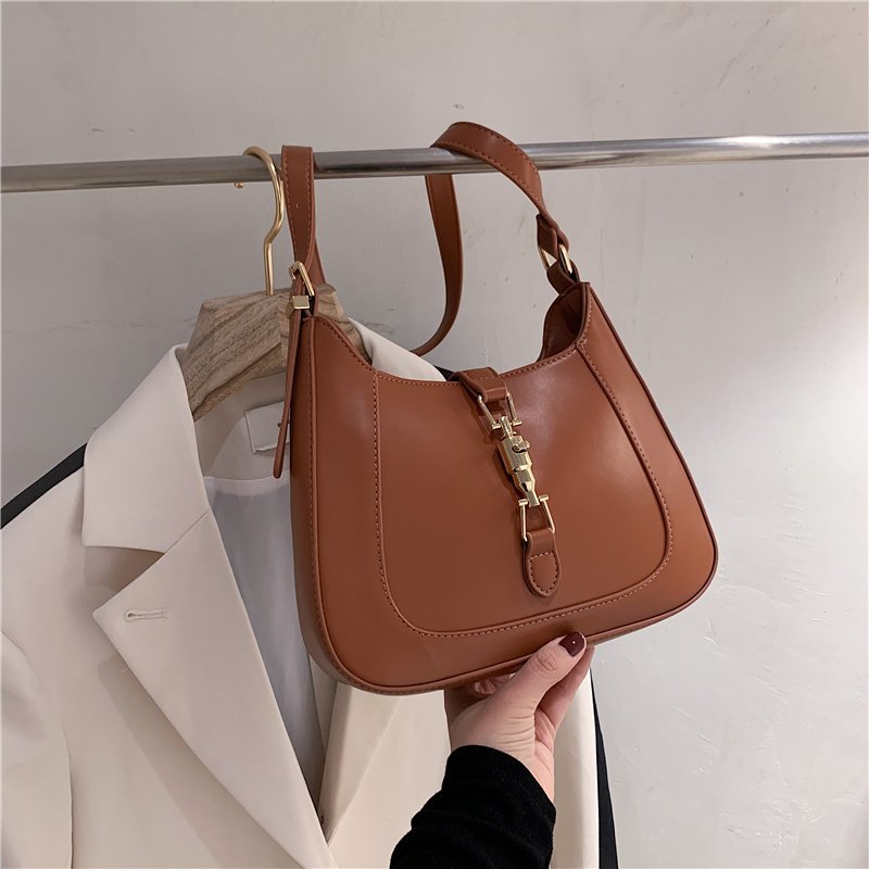 Elara's Elegant Shoulder Bag - A Unique Bag that Combines Timeless Vintage Charm and Practical Functionality. Made from Soft Vegan Leather with a Spacious Main Compartment for all your Daily Essentials.