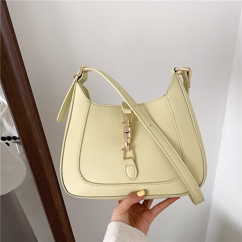 Elara's Elegant Shoulder Bag - A Unique Bag that Combines Timeless Vintage Charm and Practical Functionality. Made from Soft Vegan Leather with a Spacious Main Compartment for all your Daily Essentials.