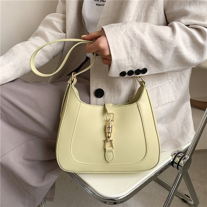 Elara's Elegant Shoulder Bag - A Unique Bag that Combines Timeless Vintage Charm and Practical Functionality. Made from Soft Vegan Leather with a Spacious Main Compartment for all your Daily Essentials.