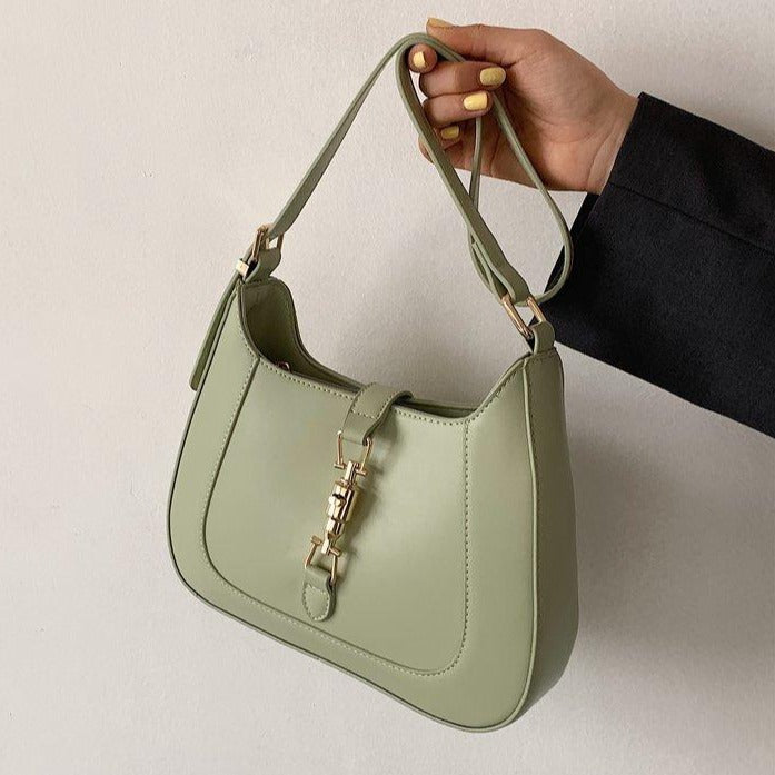 Elara's Elegant Shoulder Bag - A Unique Bag that Combines Timeless Vintage Charm and Practical Functionality. Made from Soft Vegan Leather with a Spacious Main Compartment for all your Daily Essentials.