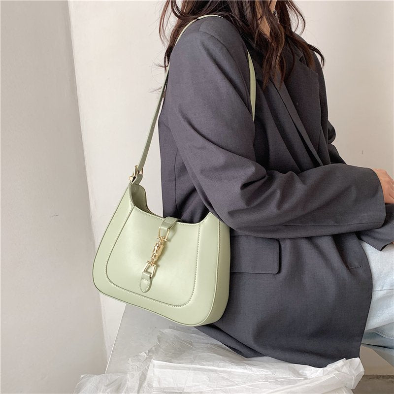 Elara's Elegant Shoulder Bag - A Unique Bag that Combines Timeless Vintage Charm and Practical Functionality. Made from Soft Vegan Leather with a Spacious Main Compartment for all your Daily Essentials.