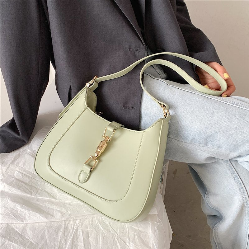 Elara's Elegant Shoulder Bag - A Unique Bag that Combines Timeless Vintage Charm and Practical Functionality. Made from Soft Vegan Leather with a Spacious Main Compartment for all your Daily Essentials.